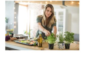 Mindful Meal Preparation: A woman carefully arranges wholesome ingredients on a plate, her expression focused and serene, embodying the practice of mindful eating through the intentional and thoughtful creation of her meal