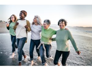 women's spending time together at the beach. building connections Boost Your Energy 