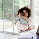 Time Hacks for Moms: A woman calmly navigating changes in her daily schedule using a digital device.