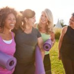 enjoying yoga outside with friends. 