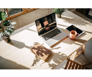 A stylish, well-organized home office desk setup, perfect for transforming your home office into a wellness-focused workspace.